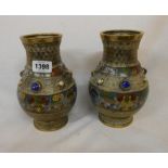 A pair of Chinese antique brass and cloisonne vases with applied cabochons to shoulder