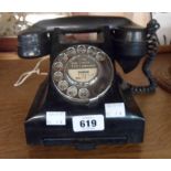A vintage black Bakelite telephone