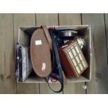 A small box of collectables including binoculars, small anniversary clock, tin, etc.