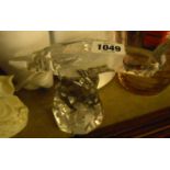 A Baccarat clear crystal glass model of a parakeet perching on a rock effect base - acid stamp