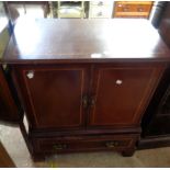 A reproduction mahogany TV cabinet