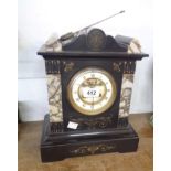 A late Victorian black slate marble cased mantel clock with visible escapement to dial and eight day