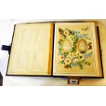 A late Victorian tooled leather Lingua Flora album with part contents of photographic portraits,