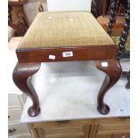 An antique mahogany framed dressing stool with upholstered drop-in seat, set on cabriole legs with