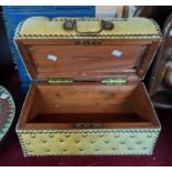 A small vintage studded leather clad casket