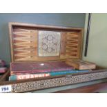 A vintage wooden inlaid folding backgammon board - sold with Scrabble and draughts