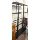 A 100cm modern painted metal framed shelving unit with three glass shelves