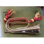 A modern reproduction brass bugle