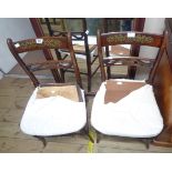 A pair of Regency simulated rosewood framed bedroom chairs with decorative brass inlay to top