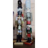 Four modern painted wood Christmas figurines