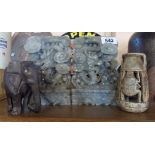 A selection of collectable items including Chinese carved soapstone dragon bookends, carved