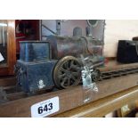 A scratch built model locomotive on wooden display track stand - a/f