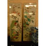 A pair of large 19th Century Chinese porcelain panels profusely decorated with various birds