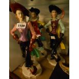 A set of three mid Century Italian pottery figurines, depicting Musketeers