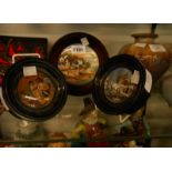 Three 19th Century Staffordshire Prattware pot lids in later frames