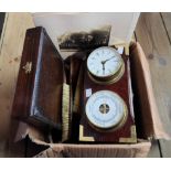 A box containing assorted collectable items including old wooden brushes, clock/barometer, etc.