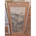 A framed 20th Century Chinese painted silk mountain river landscape picture within a material border