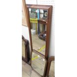 A stained wood framed narrow oblong wall mirror - sold with a vintage gilt framed wall mirror with