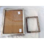 A silver fronted photograph frame with oak easel back - to take 17.5cm X 13cm - sold with a small