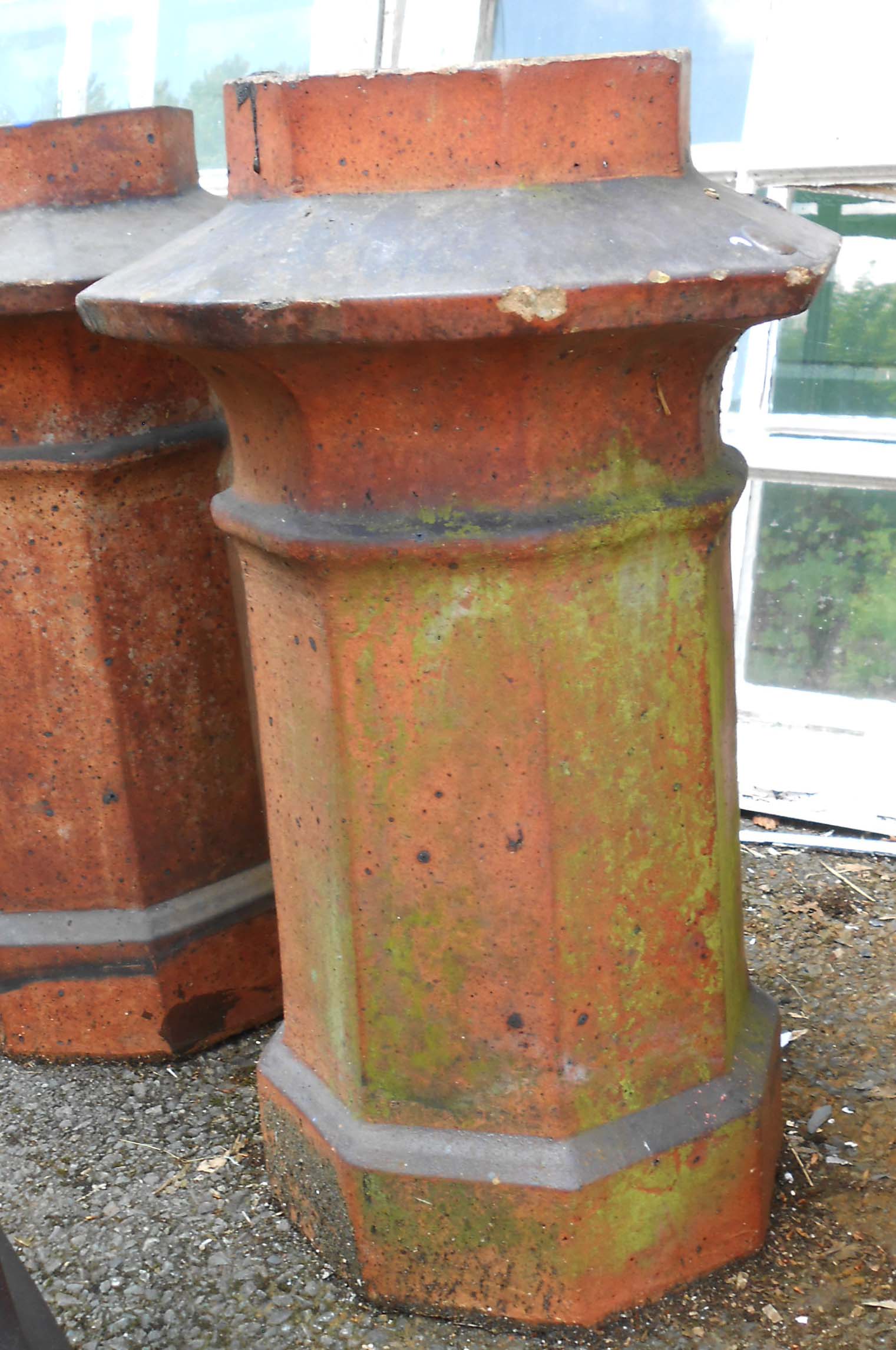 A large salt glazed stoneware chimney pot of pagoda form