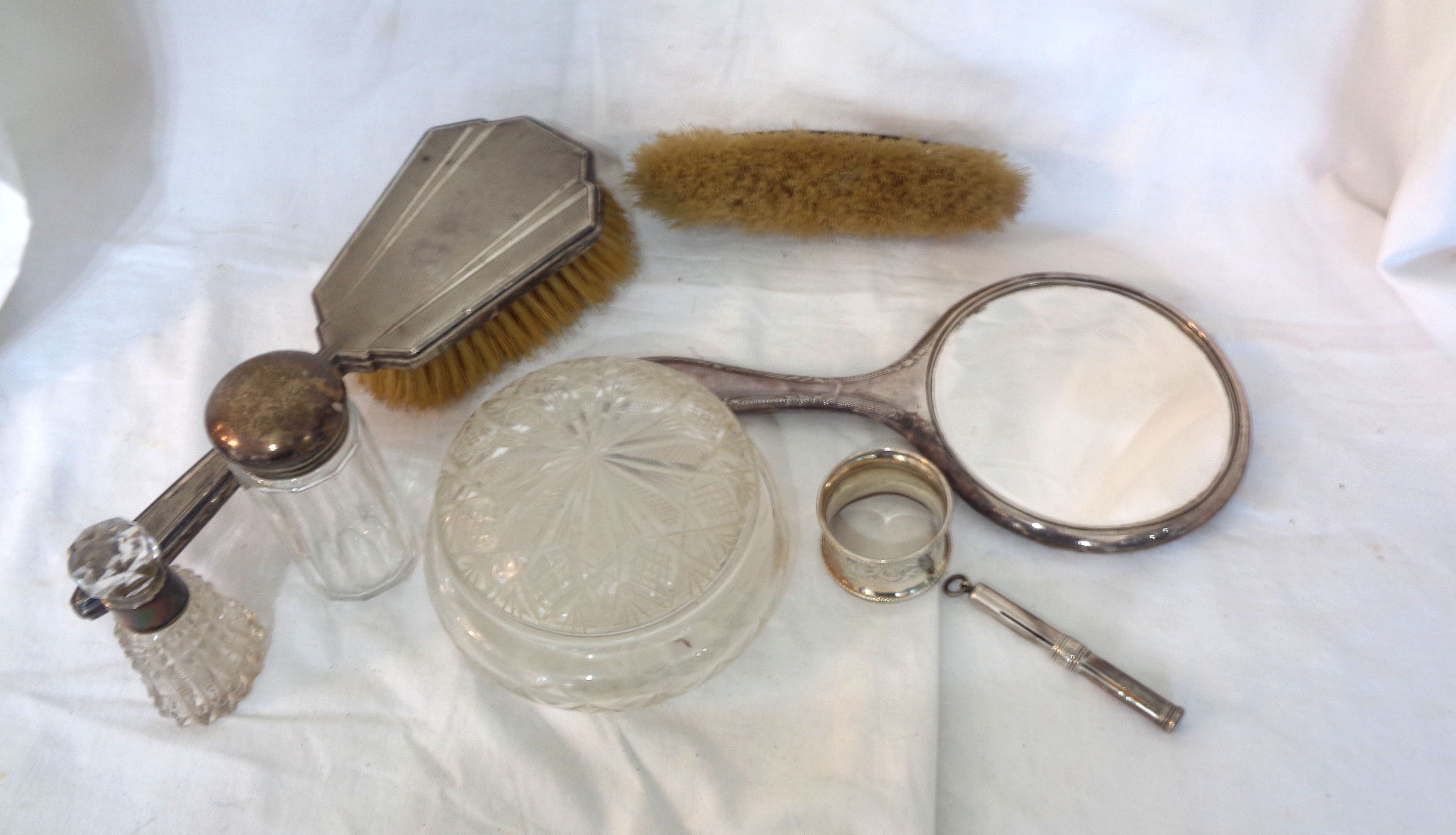 A part silver mounted dressing table set, silver pencil a/f and a napkin ring