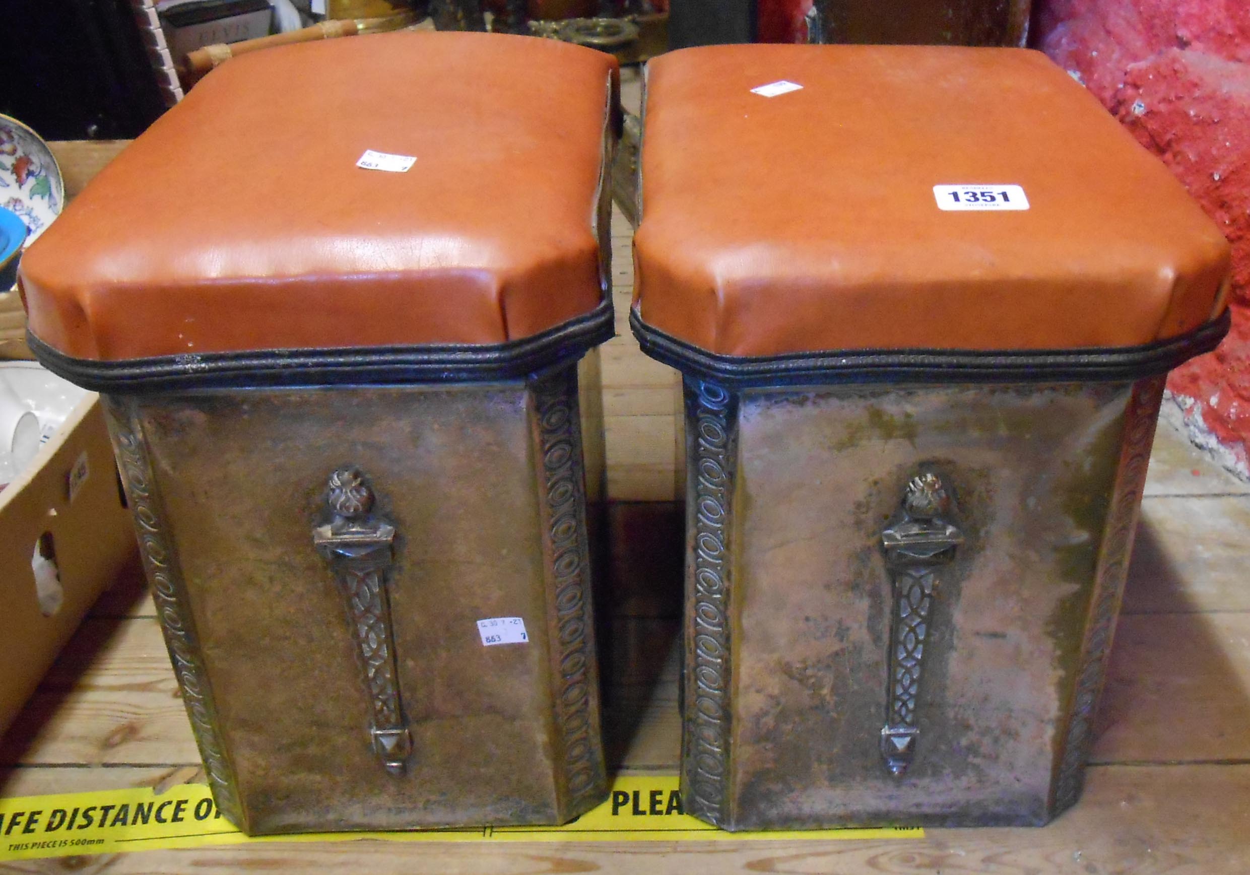 A pair of 1920's box club fender ends with lift-top Rexine seats on plated metal coal boxes