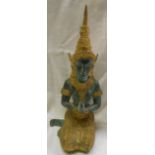 A 20th Century cast metal Far Eastern figurine with patinated and gilt finish