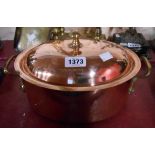 A vintage Helvetia copper two handled casserole dish