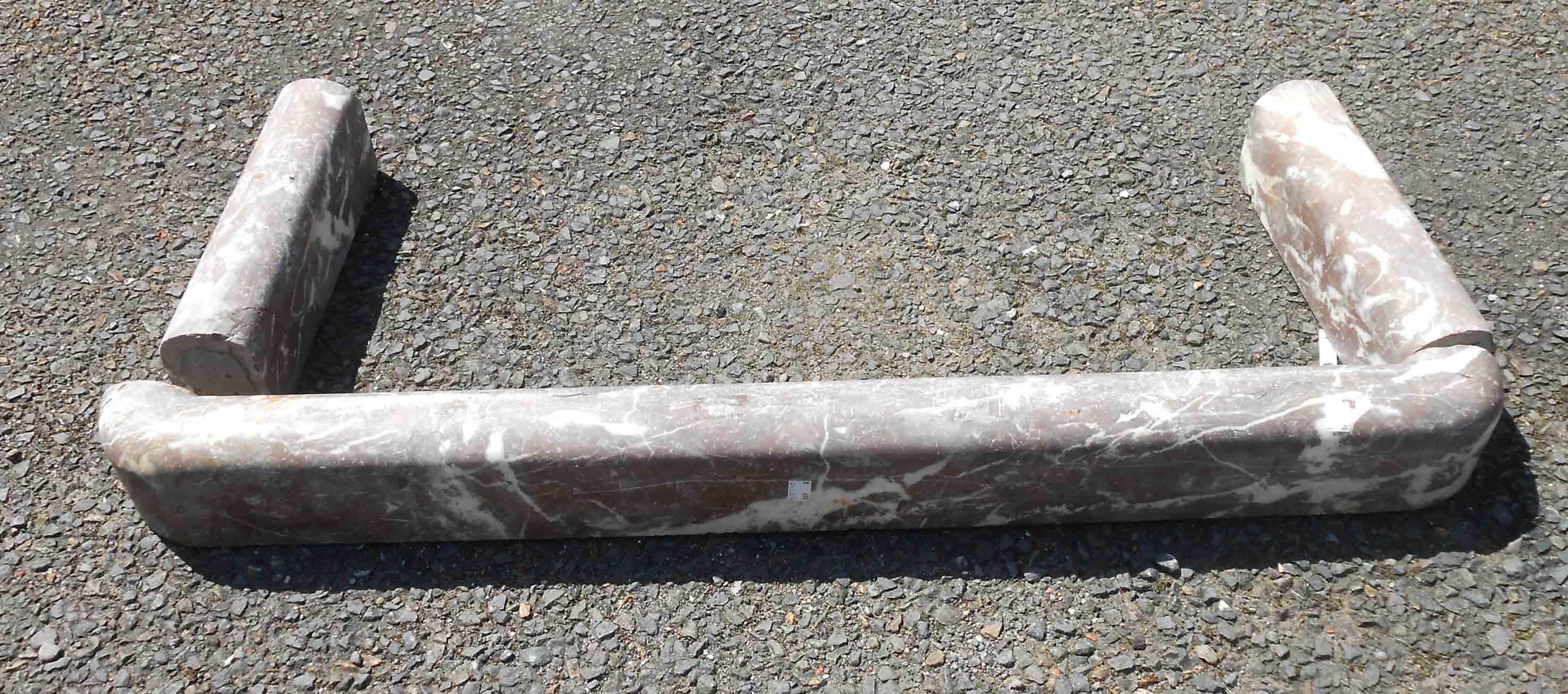 A marble fire kerb