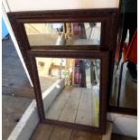 Two early 20th Century stained oak framed oblong mirrors with similar moulded decoration