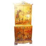 A 78cm vintage chinoiserie cabinet with shaped pediment, two pairs of cupboard doors and central