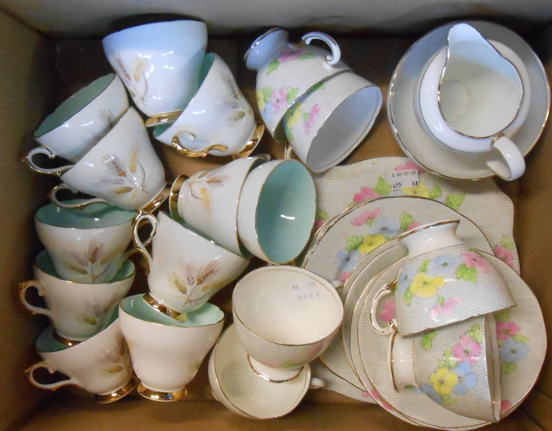A box containing a Salisbury fine bone china part tea set comprising six trios, milk and sugar,