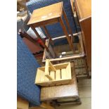 A selection of small furniture items comprising three occasional tables and a trug