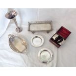 Various small silver and white metal items including shaped dish, trumpet vase and napkin rings,