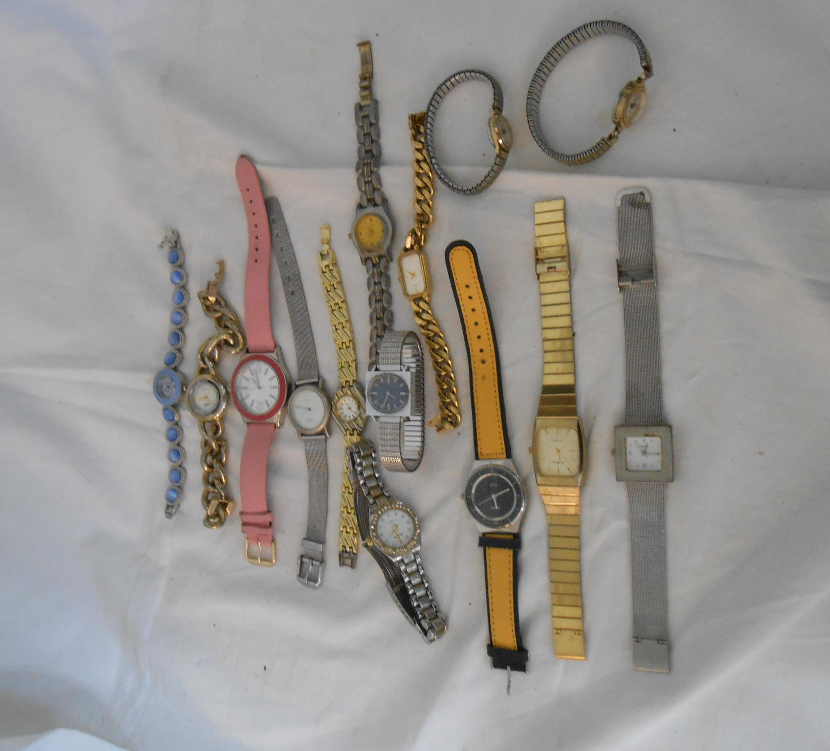 A bag containing mainly modern lady's wristwatches