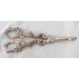 A pair of ornate silver plated grape scissors with cast grapevine decoration to handles