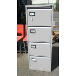 A four drawer modern grey painted metal filing cabinet - with key