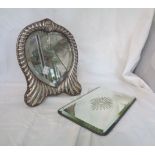 An ornate silver fronted dressing table mirror with damaged heart shaped plate - sold with a