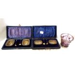 Two cased sets of two each silver salts, both with associated spoons - sold with a London silver