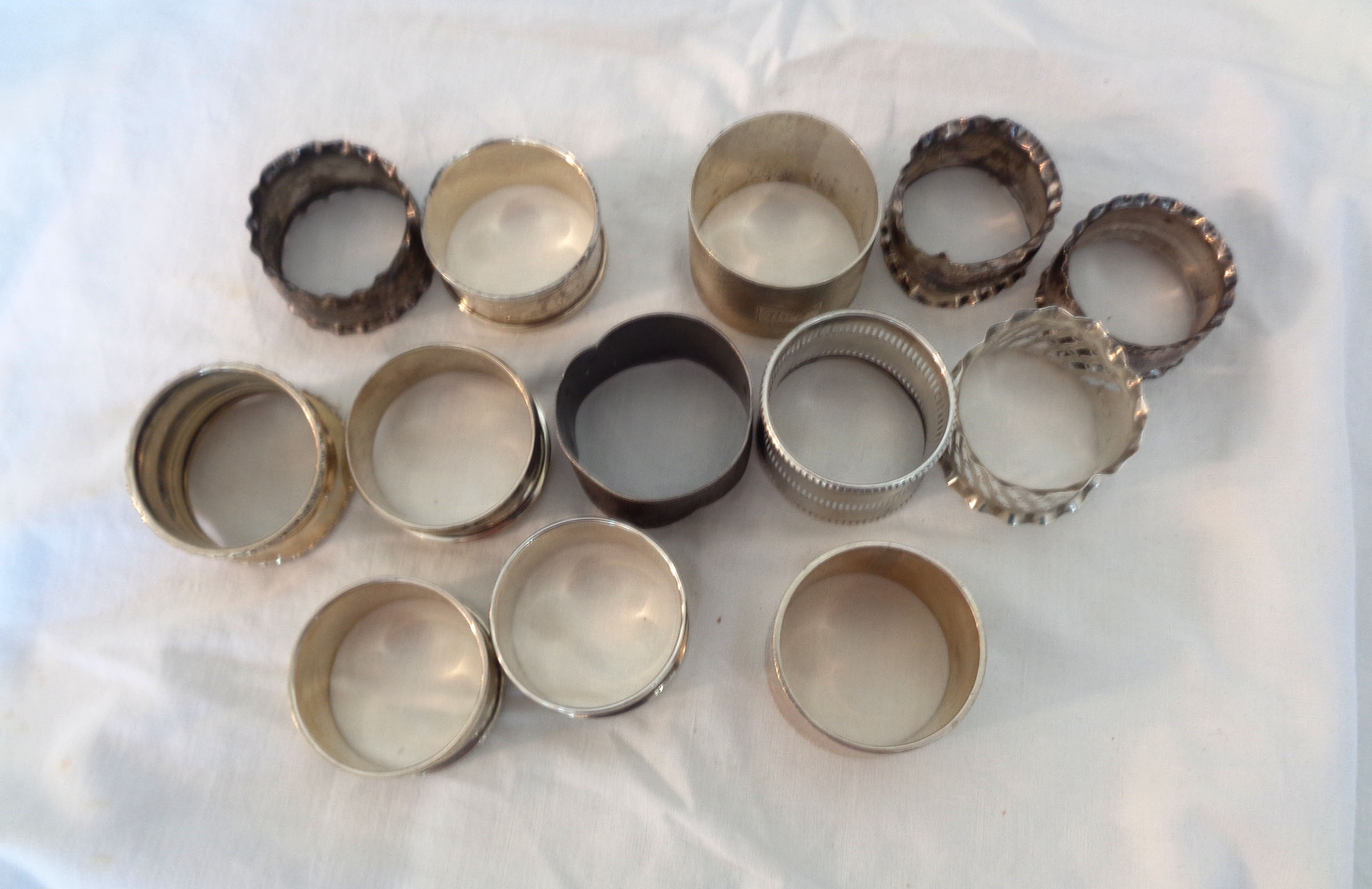 A collection of assorted silver napkin rings - some personalised, various condition