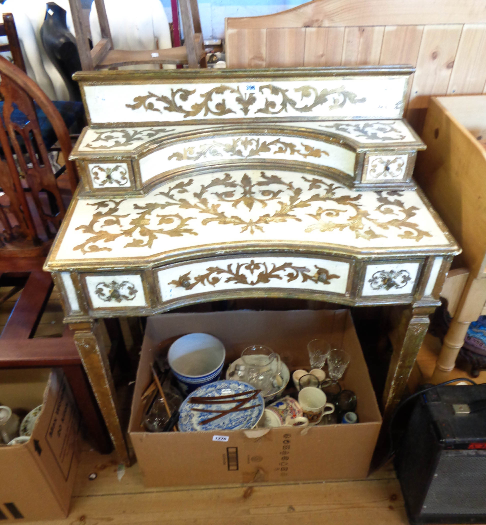 A 80cm late 20th Century painted and parcel gilt decorated desk with flanking drawers to