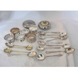 Various small silver spoons and napkin rings, also two plated snuff boxes