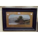 A late Victorian ebonised framed and arched gilt slipped oil on card, depicting a lakeland view with