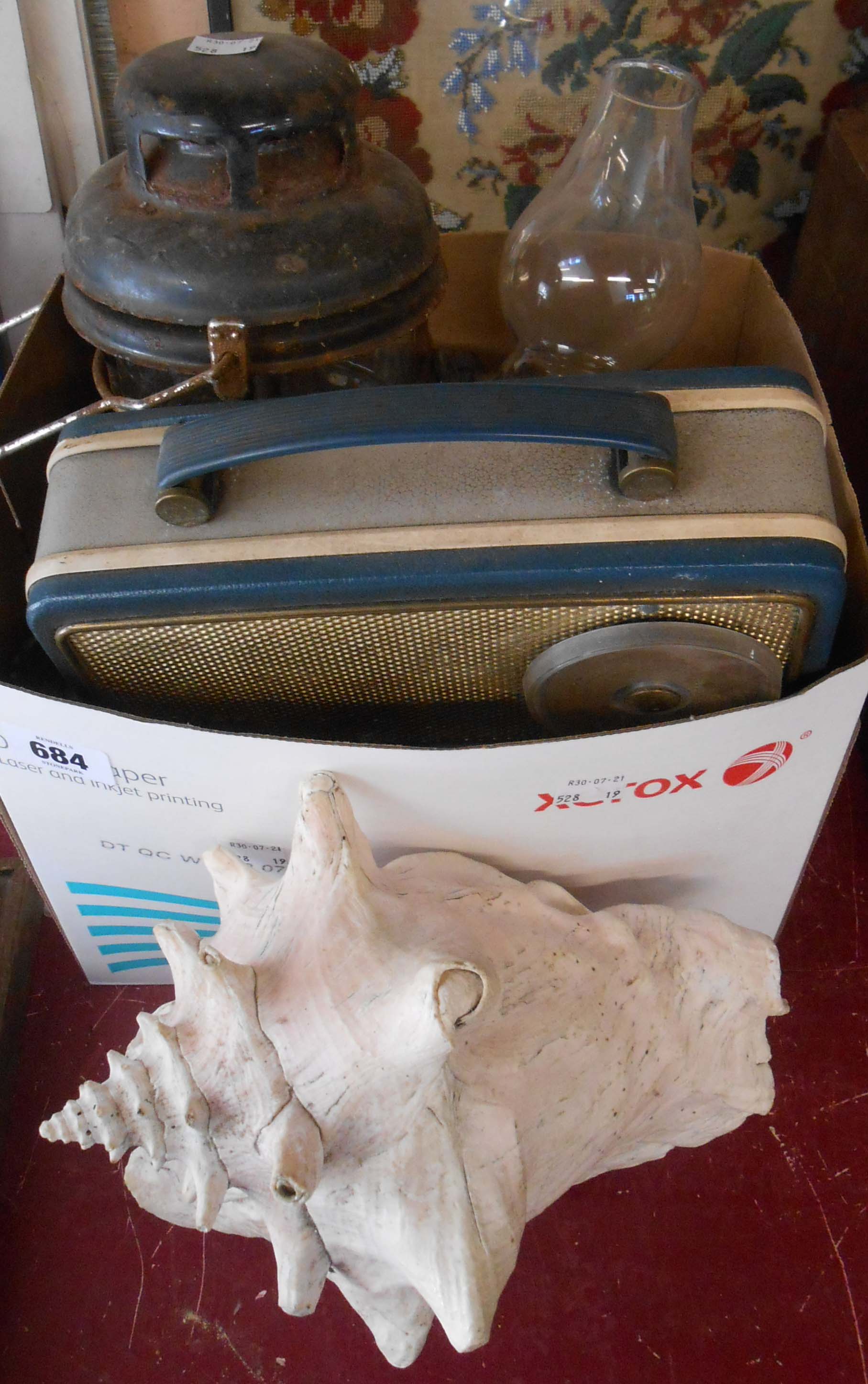 A box of collectable items including Tilley lamp, Norwegian pewter items, vintage Ecko transistor