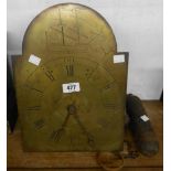 An antique alarm wall clock movement of maritime interest, the 25.5cm arched brass dial with