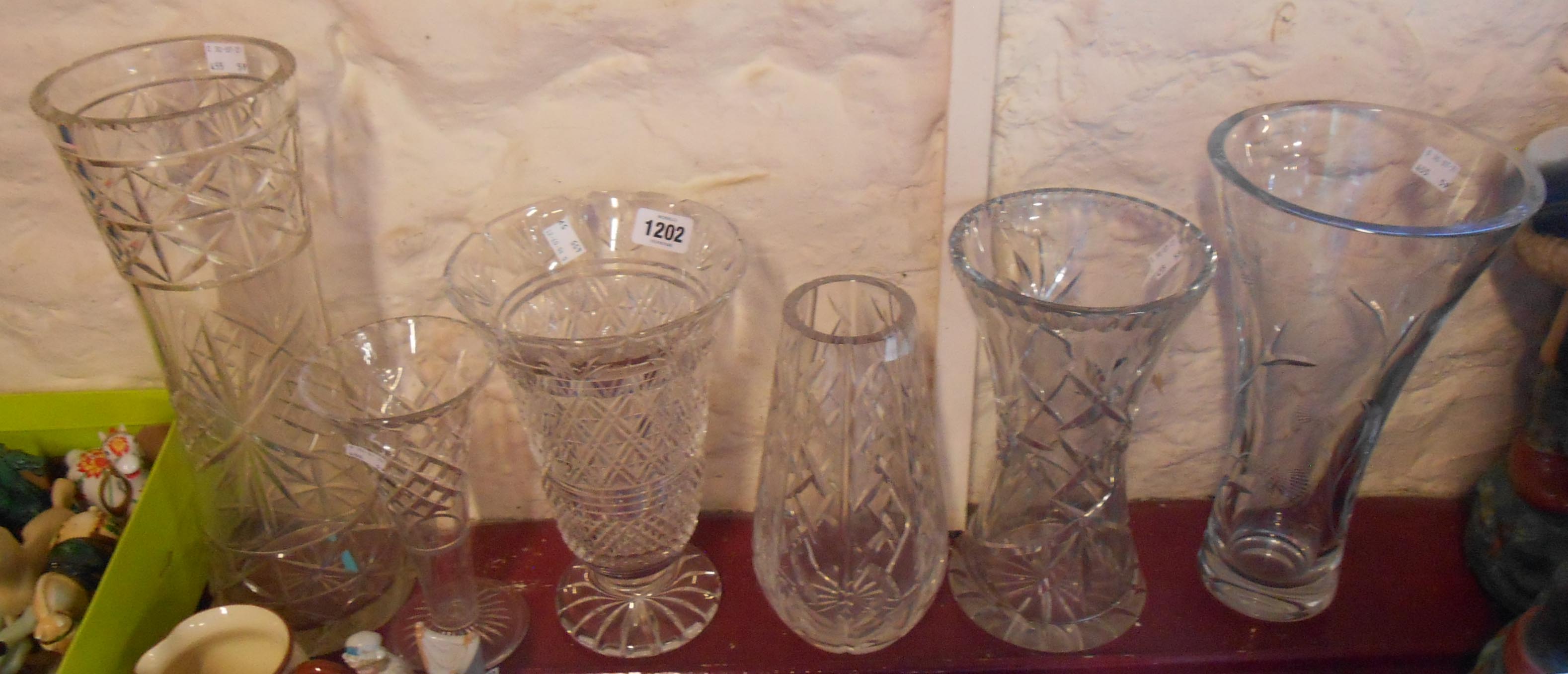 Six cut glass vases including Waterford, Edinburgh Crystal, etc. - various condition