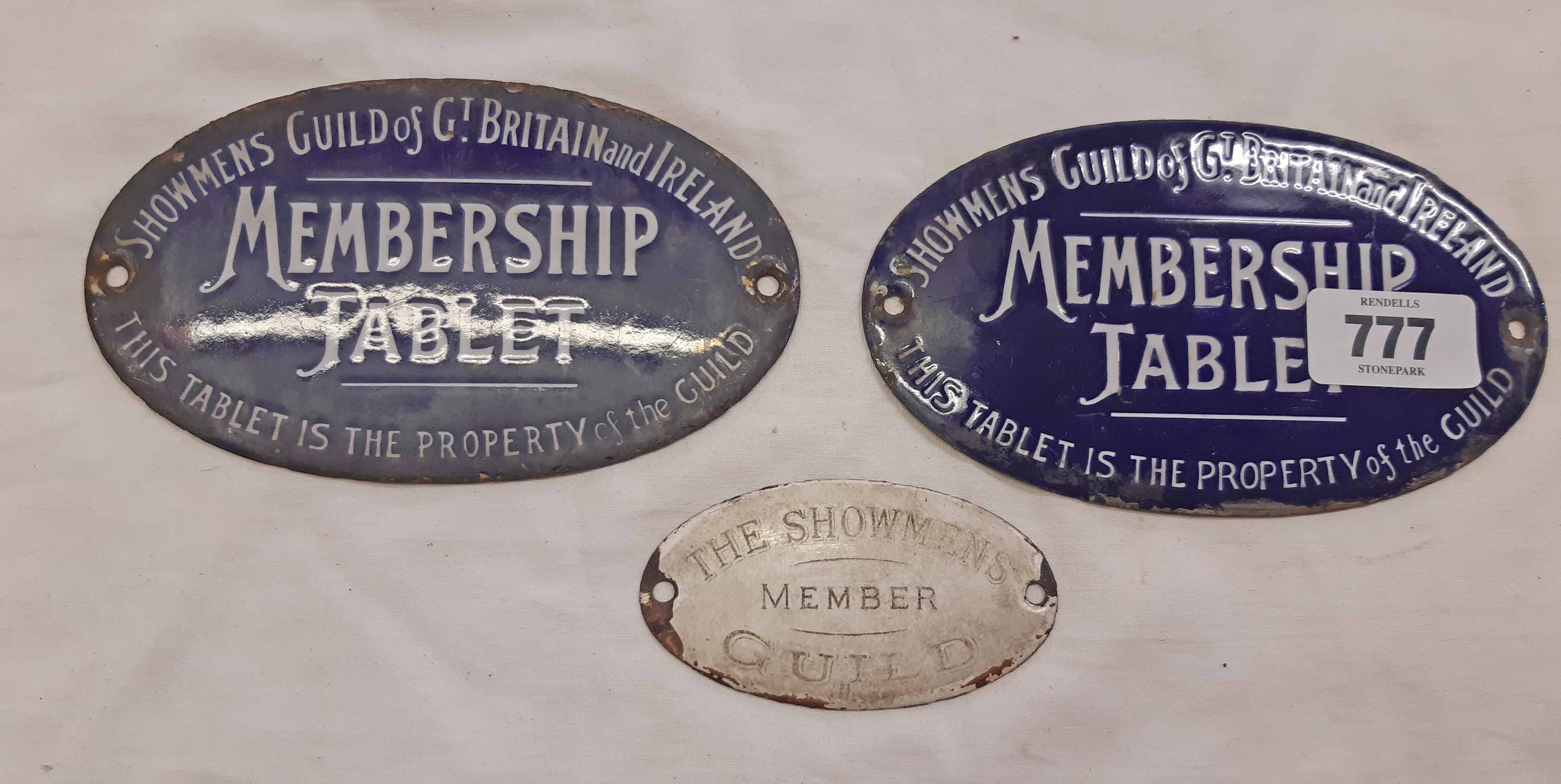 Two blue enamel Showmens Guild of Gt. Britain and Ireland membership tablets with white