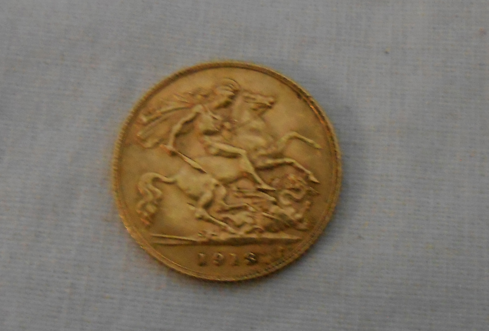 A 1913 gold Half Sovereign