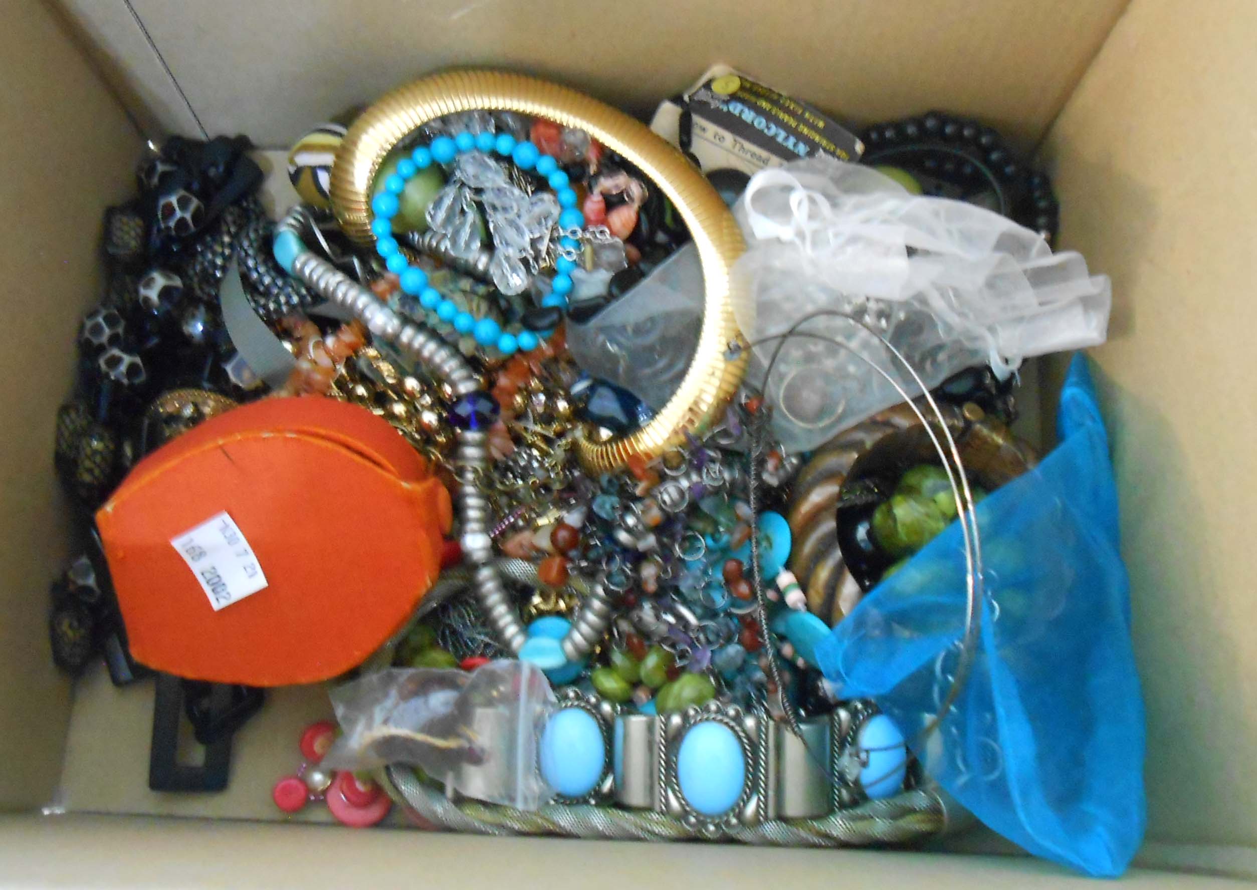 A box containing a quantity of assorted costume jewellery