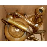 A box containing a pair of 19th Century candlesticks, brass kettle, etc.